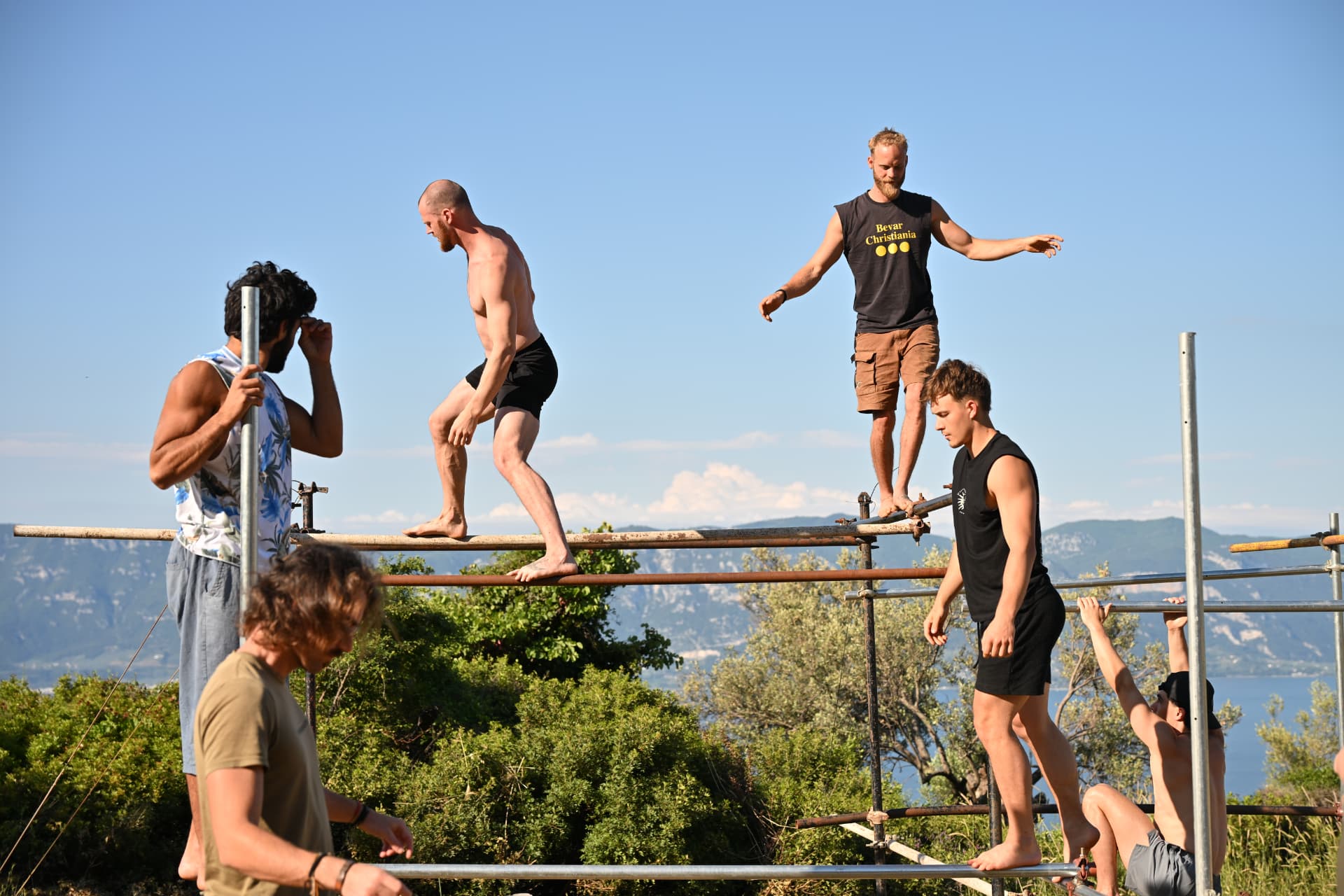 Residents training together on the outdoor balance scaffold